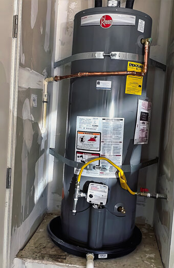 https://tuarthillhotwater.com.au/uploads/2025/06/electric-hot-water-system-32635.jpg