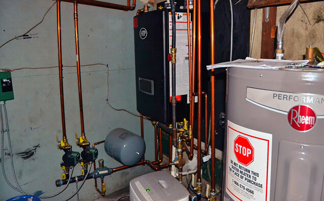 https://tuarthillhotwater.com.au/uploads/2025/06/electric-hot-water-system-58729.jpg