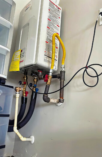 https://tuarthillhotwater.com.au/uploads/2025/06/instant-hot-water-systems-65049.jpg