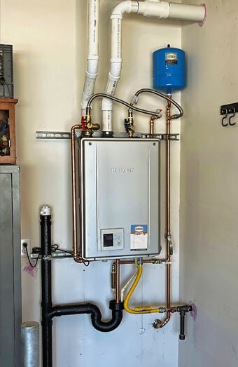 https://tuarthillhotwater.com.au/uploads/2025/06/instant-hot-water-systems-98444.jpg